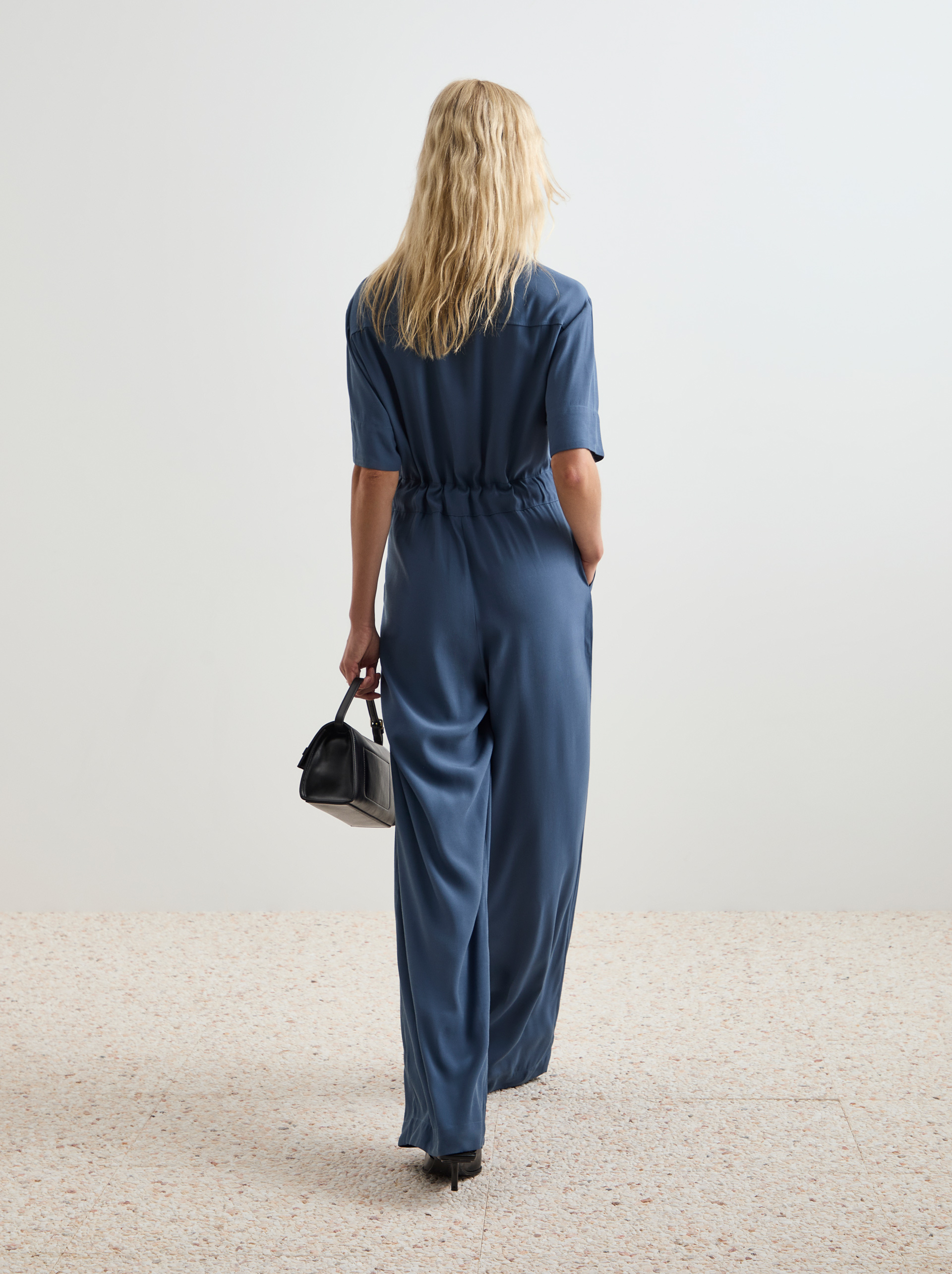 Short sleeve fluid jumpsuit