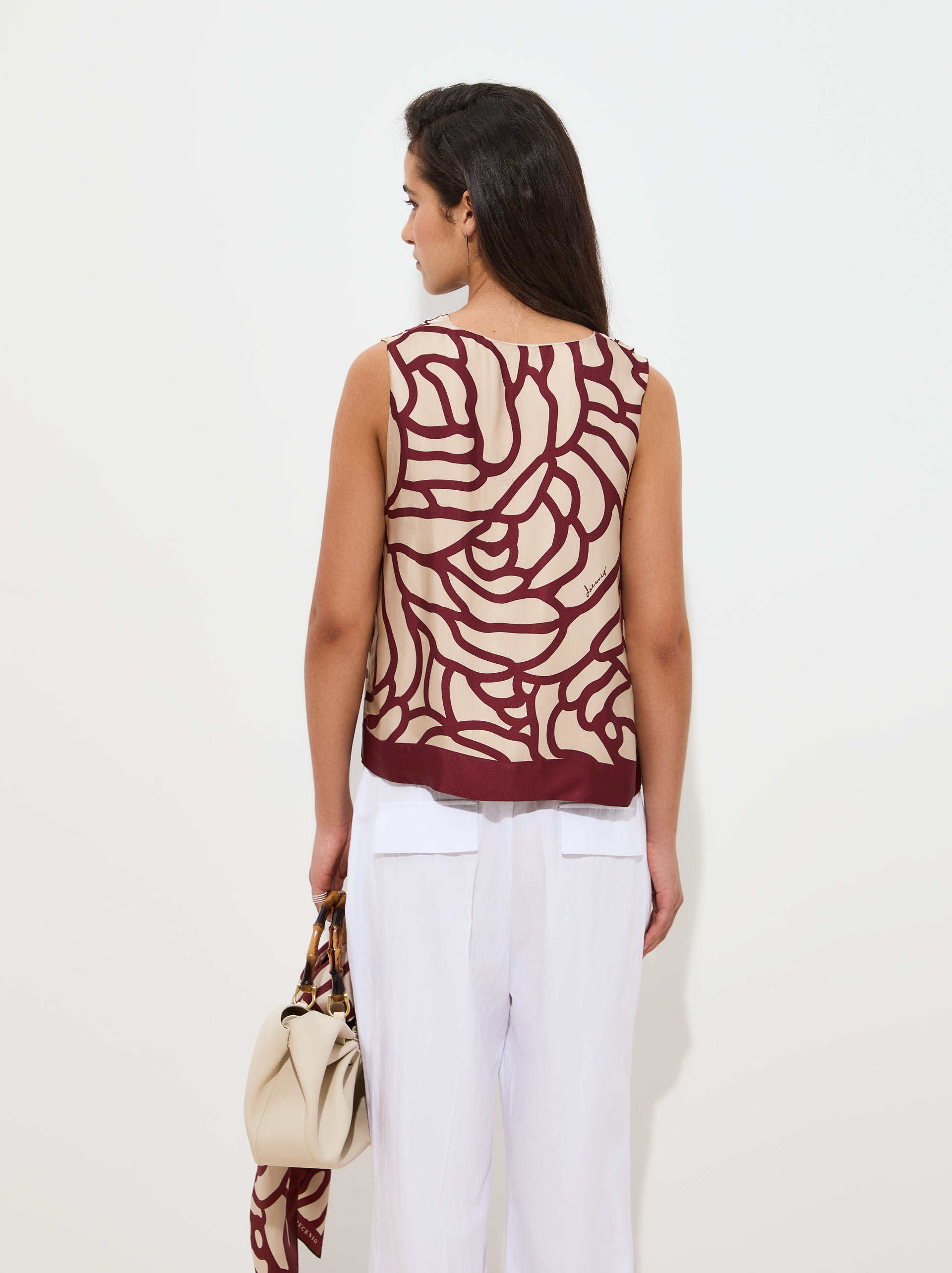 Top vaporoso estampado