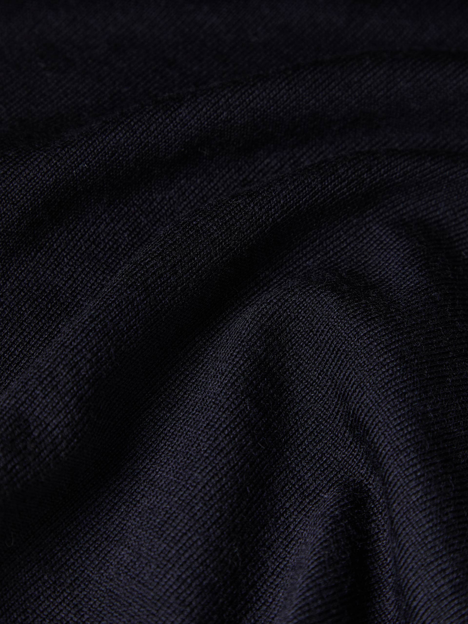Camisola de gola alta em lã merino