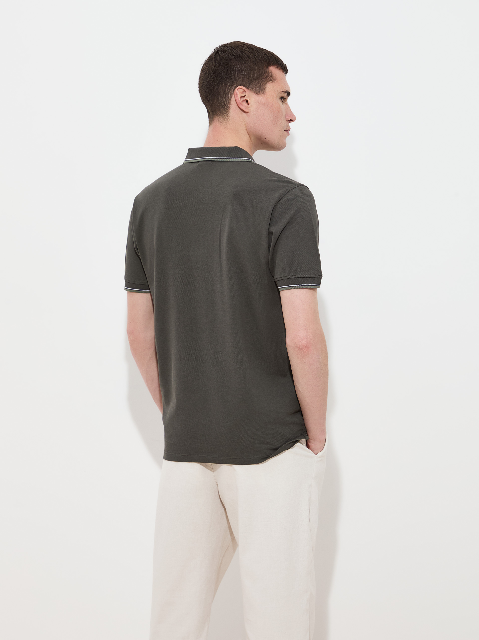 Polo piqué de algodão com riscas