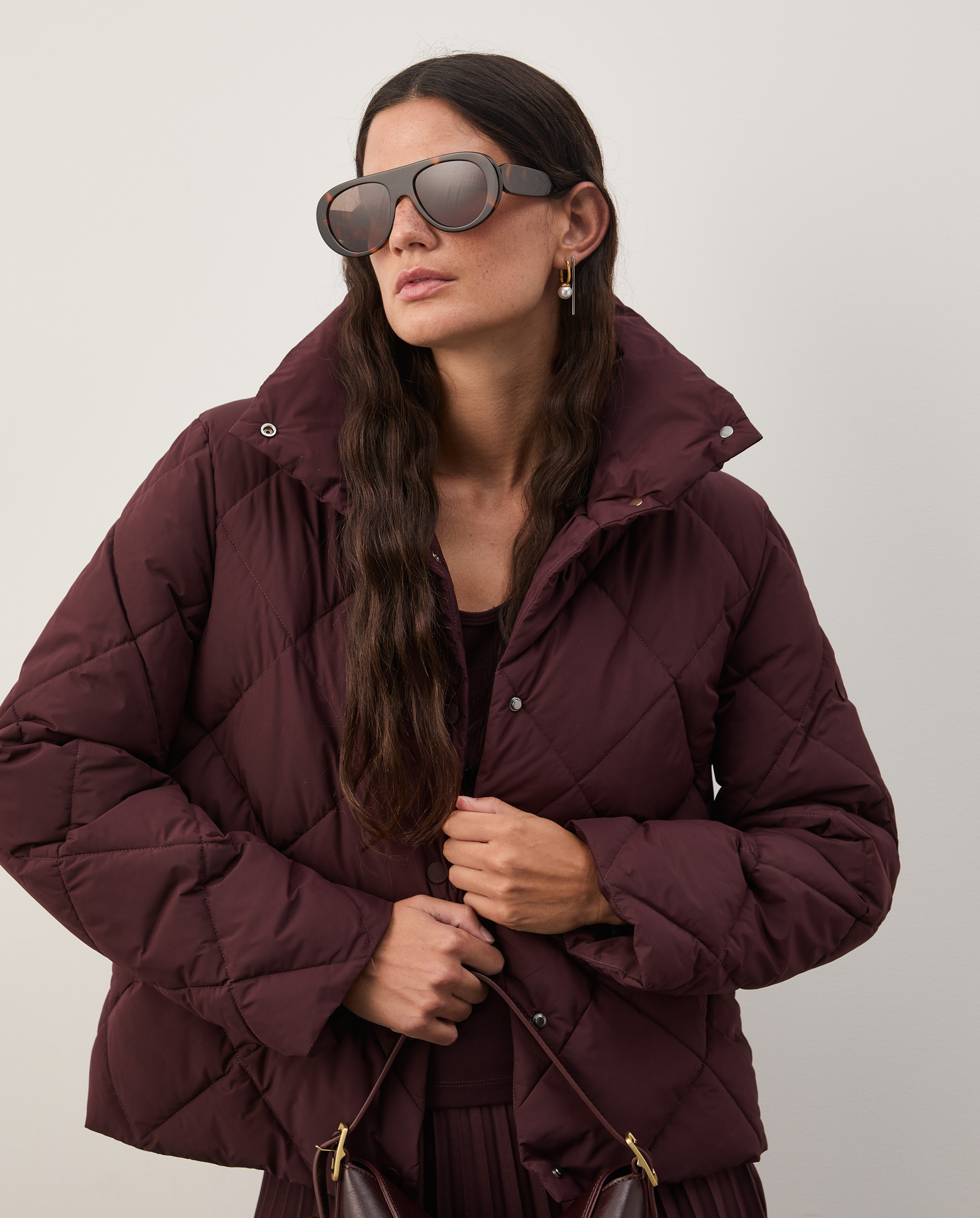 Padded jacket with a high collar