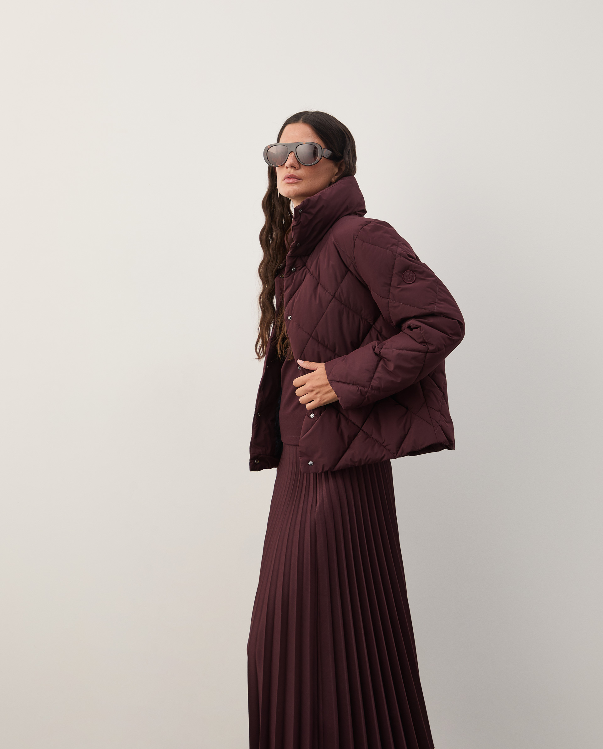 Padded jacket with a high collar