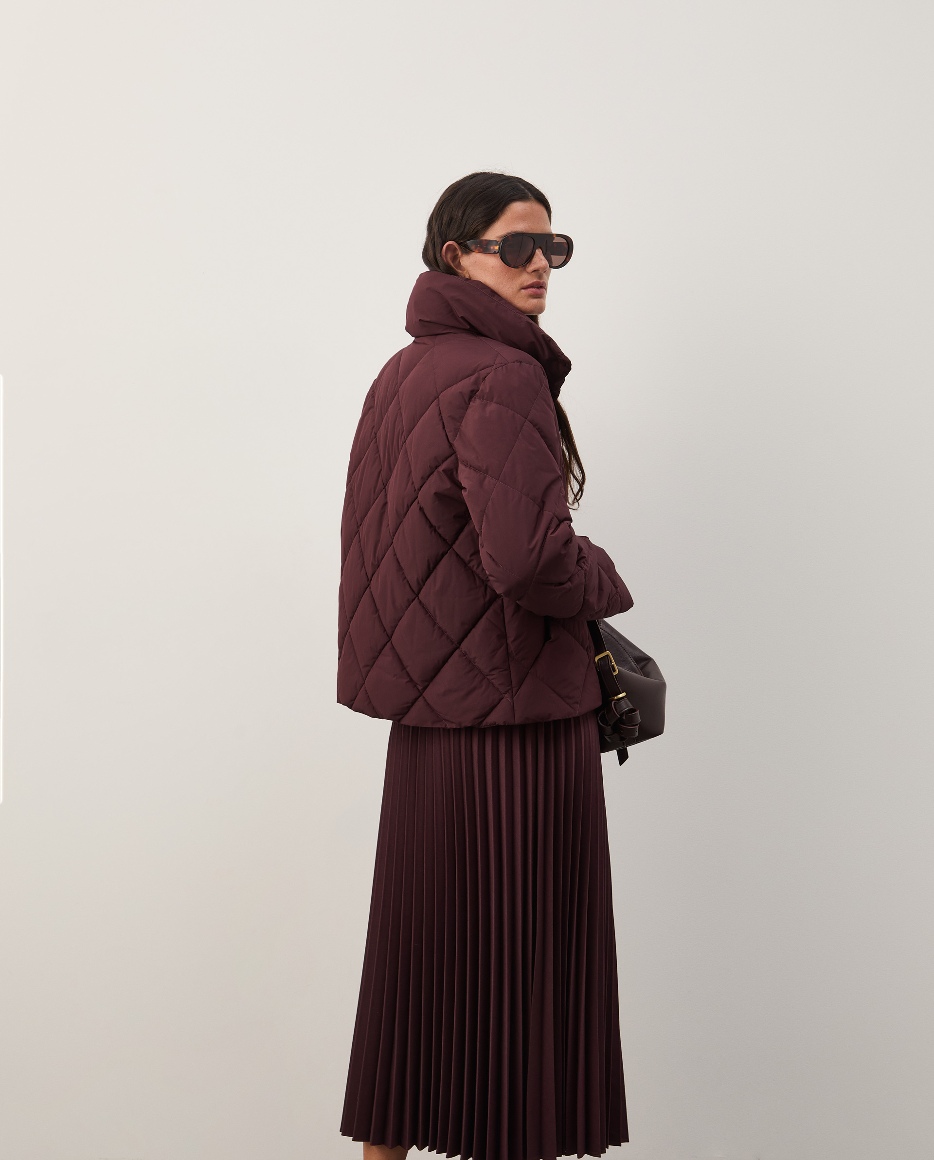 Padded jacket with a high collar