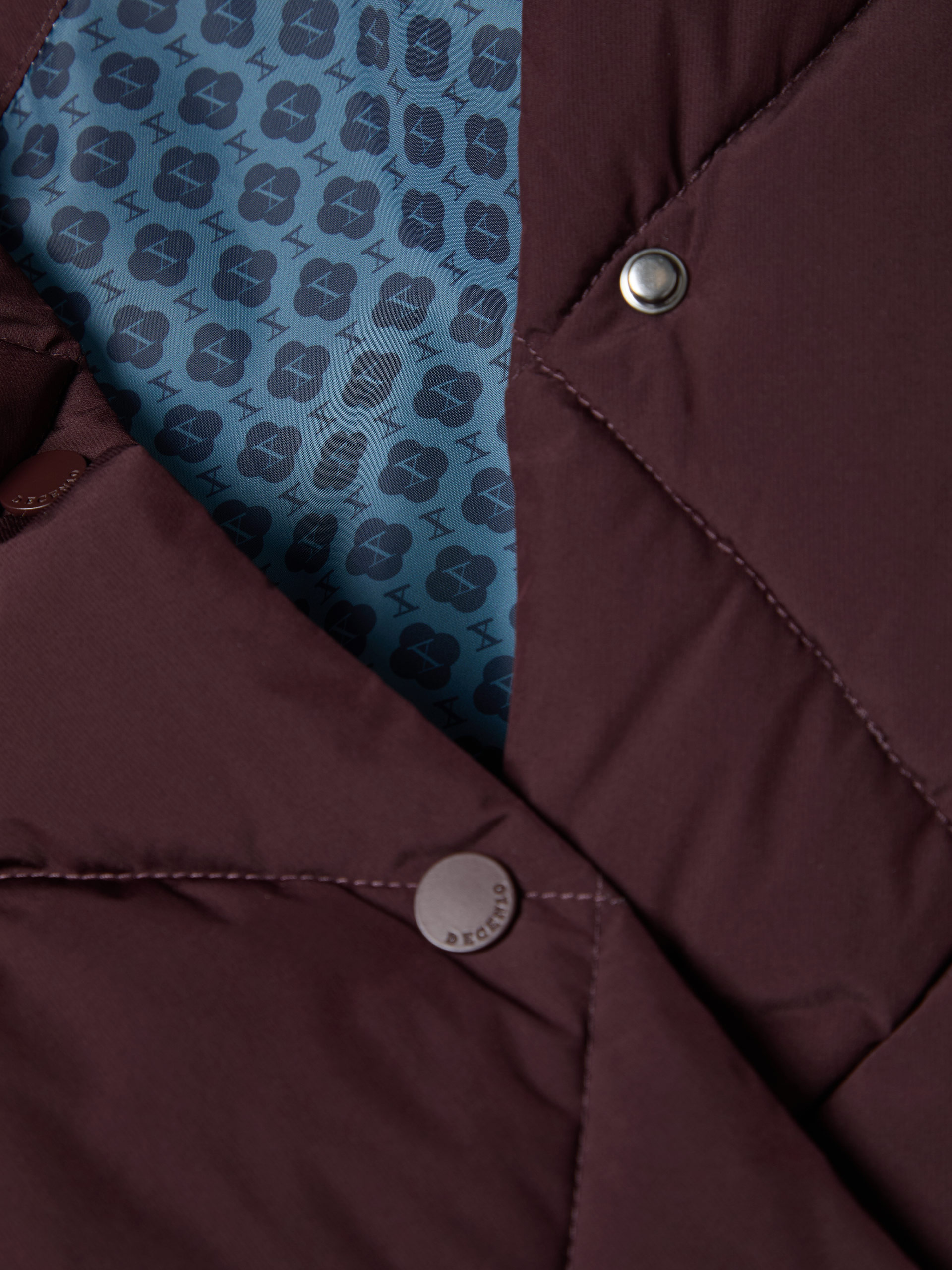 Padded jacket with a high collar