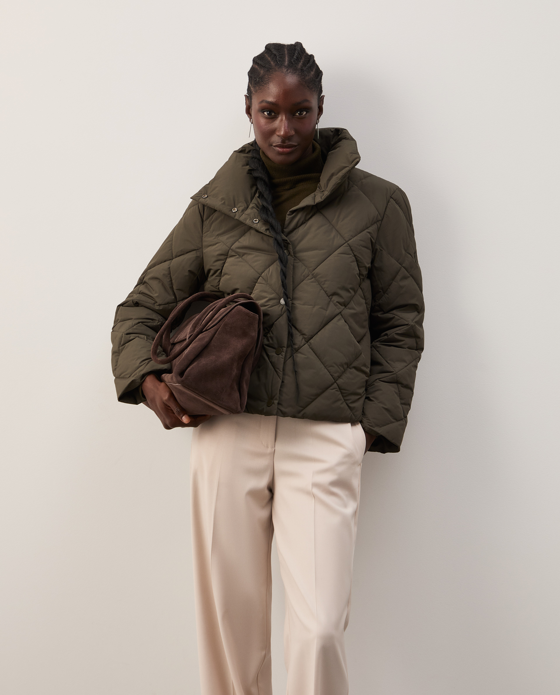 Padded jacket with a high collar