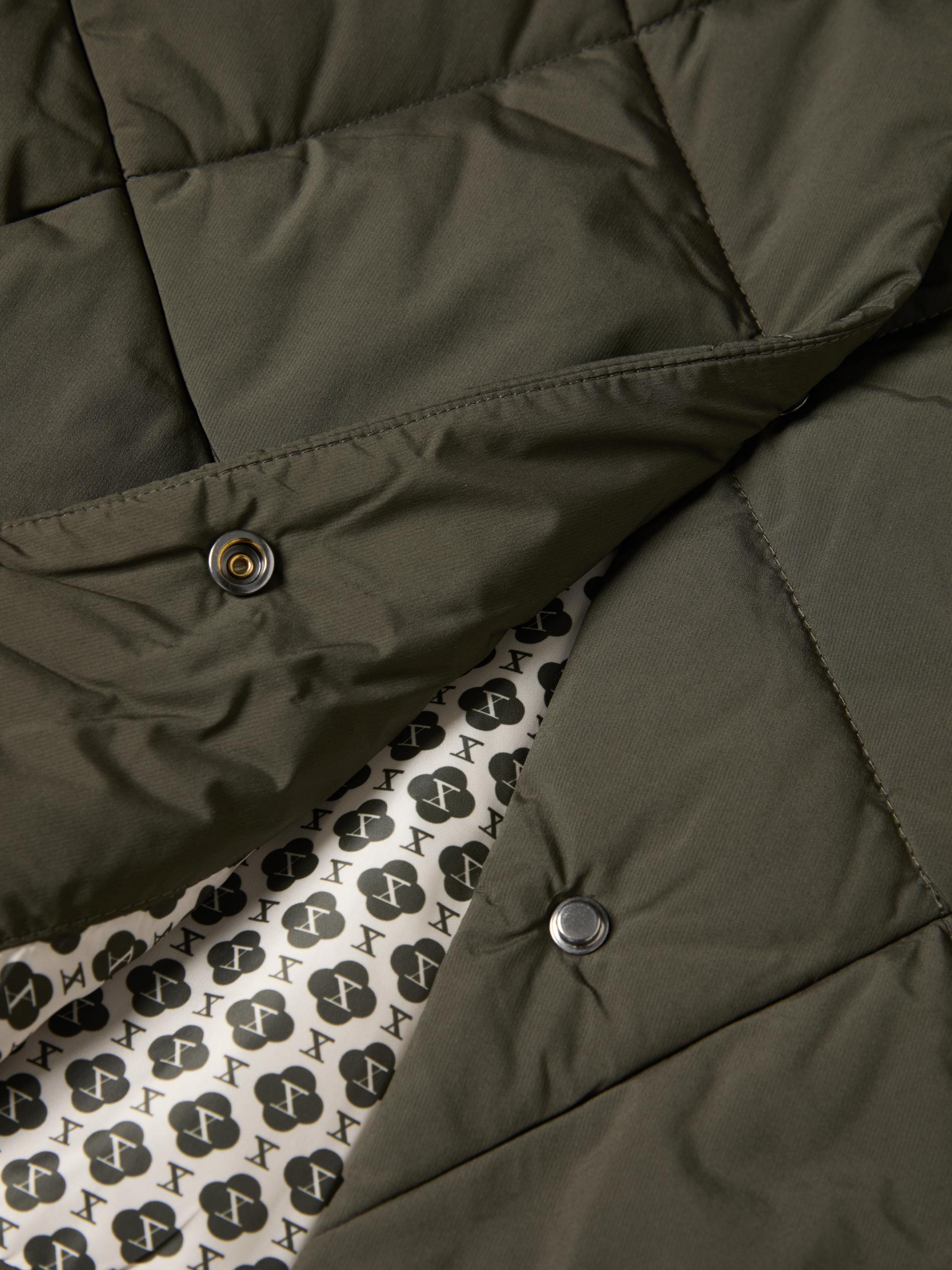 Padded jacket with a high collar