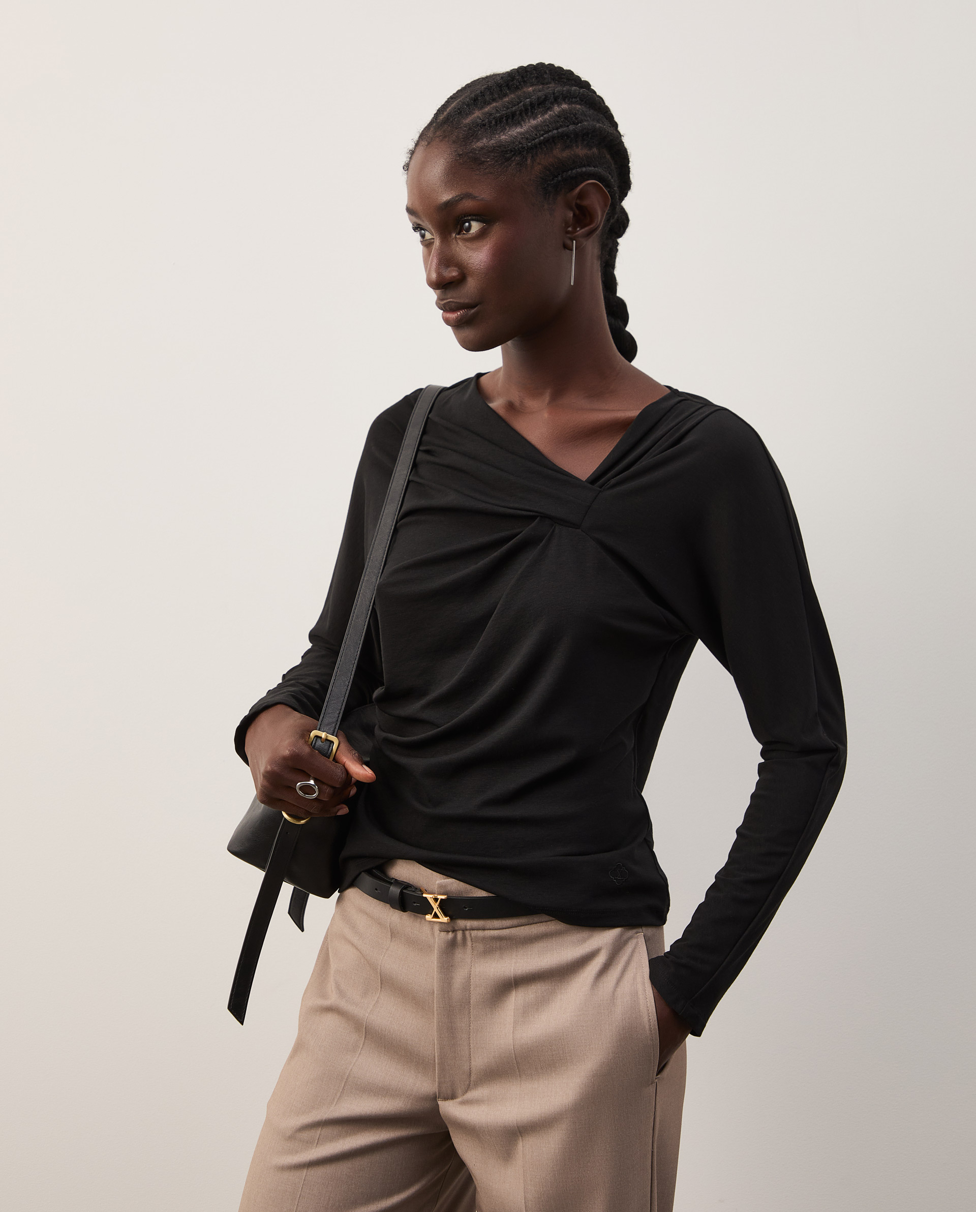 Sweater with asymmetrical neckline