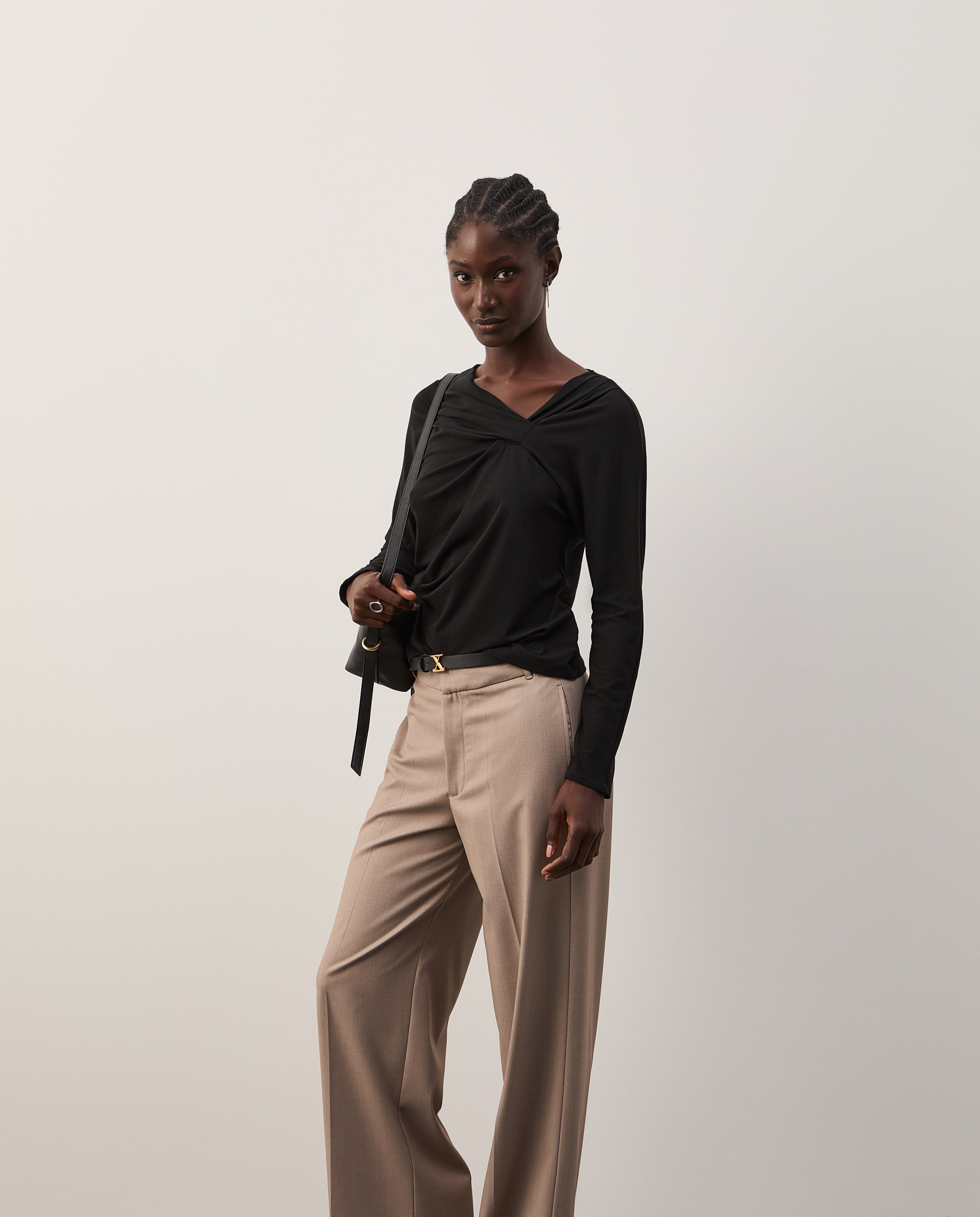 Sweater with asymmetrical neckline