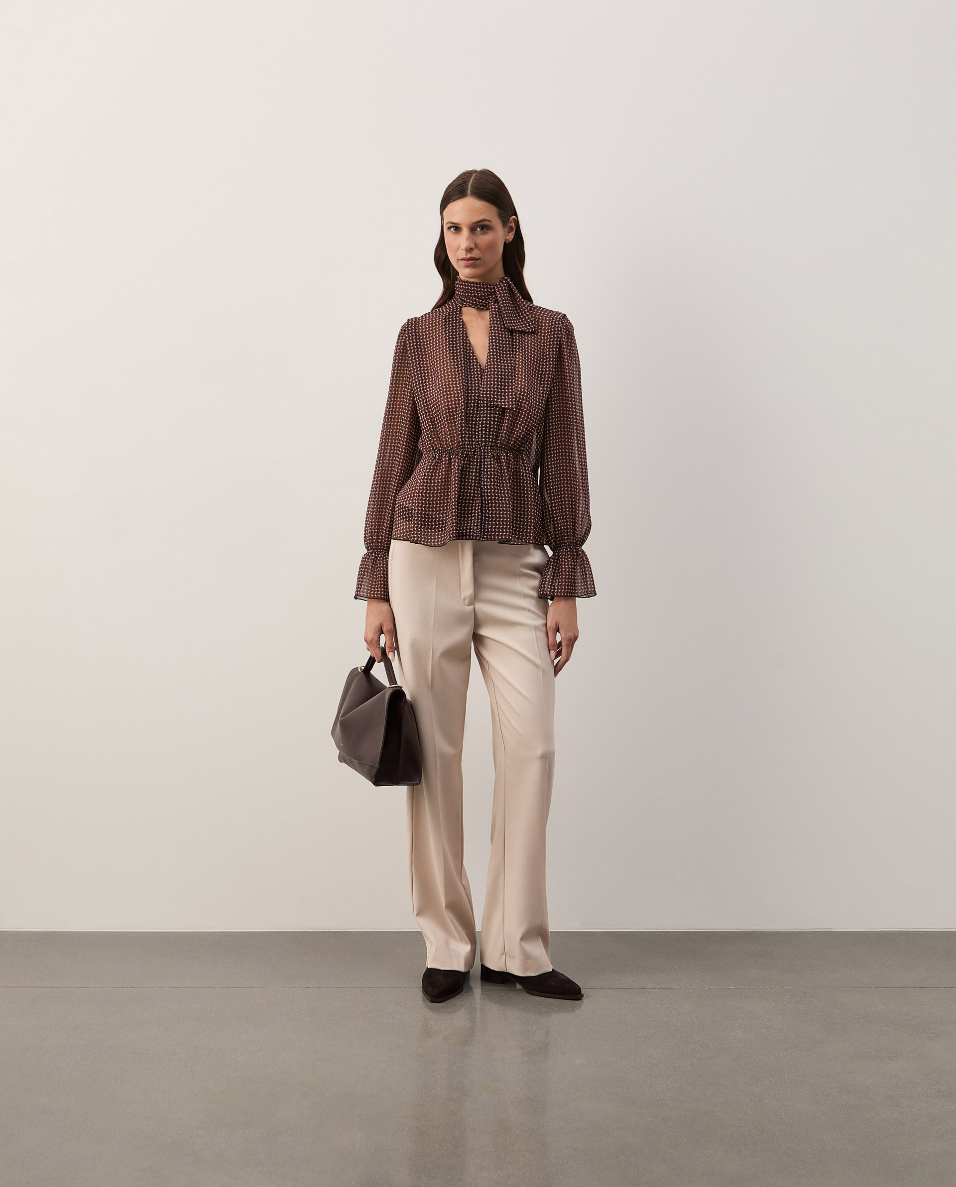 Flowy blouse with a bow