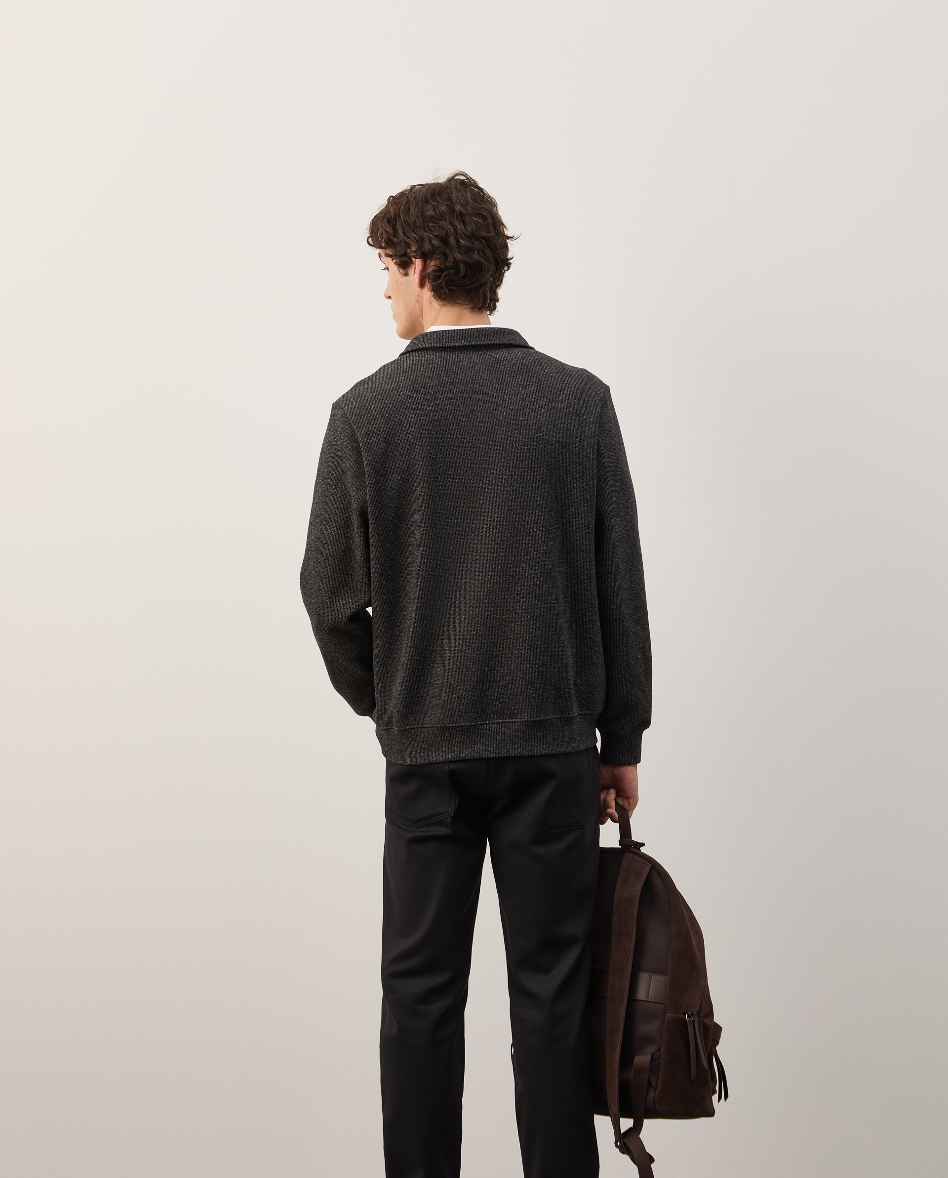 Two-tone sweater with half-zip closure
