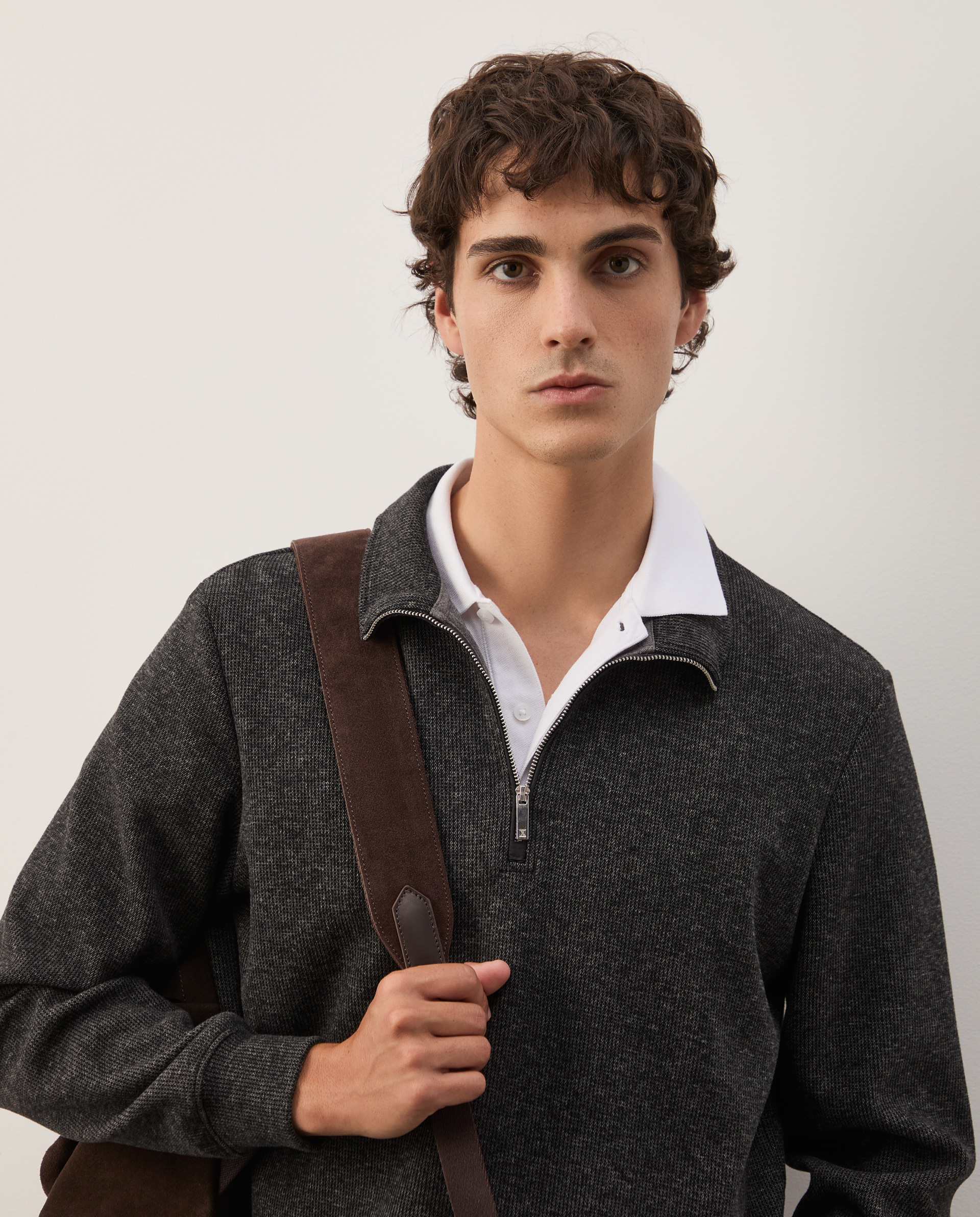 Two-tone sweater with half-zip closure