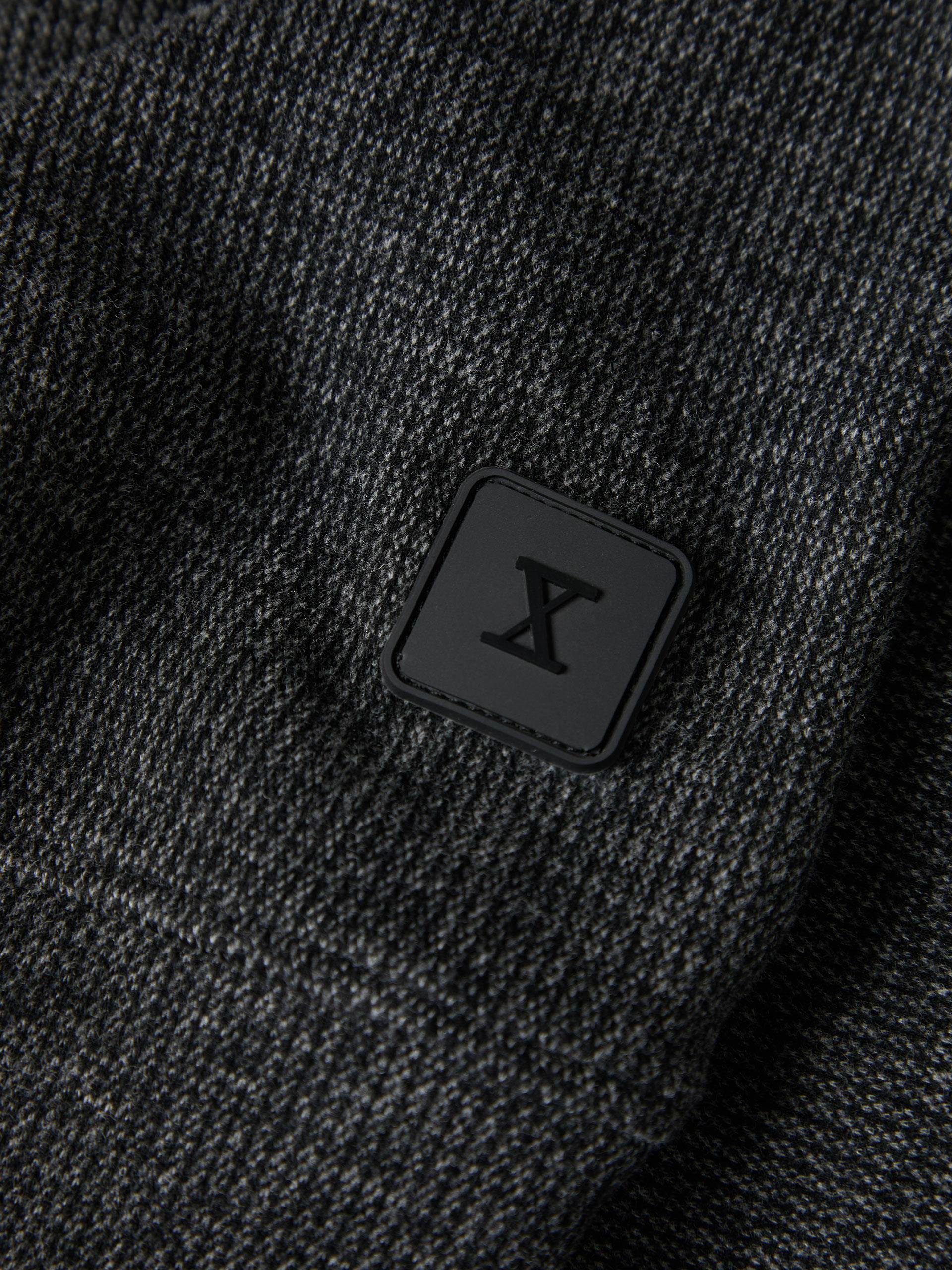 Two-tone sweater with half-zip closure