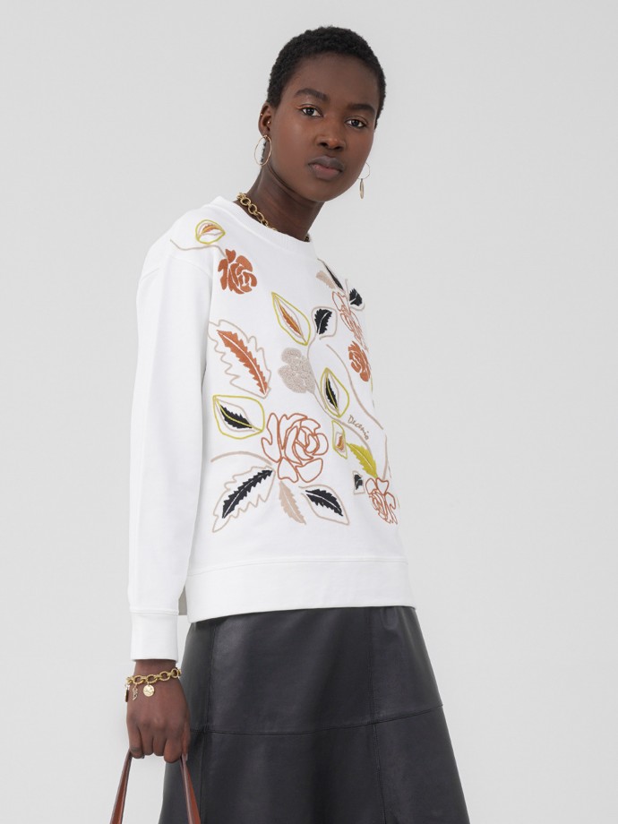 Sweatshirt bordada motivos florais