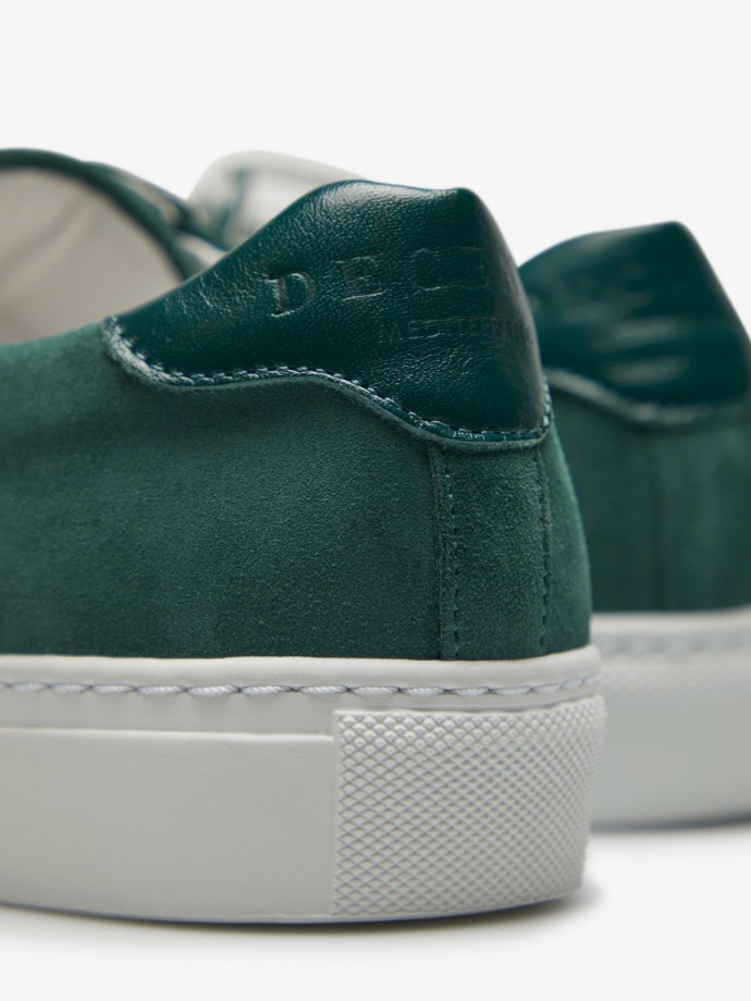 Green sneakers with logo detail