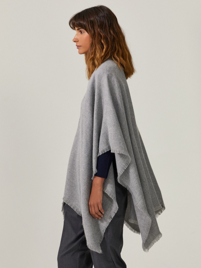 Poncho with fringes