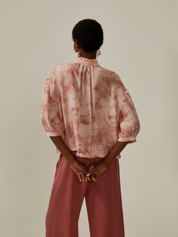 Fluid blouse with floral motifs