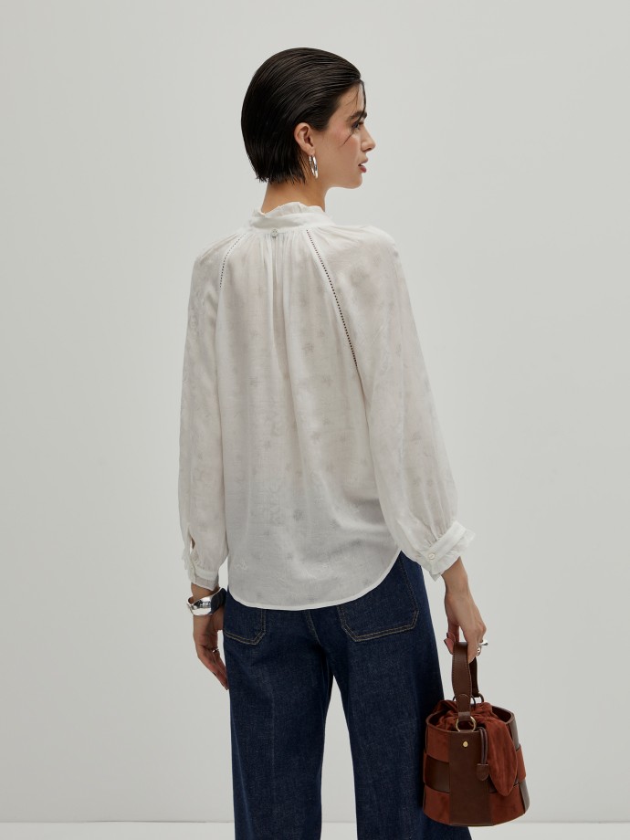 Blouse with pleats