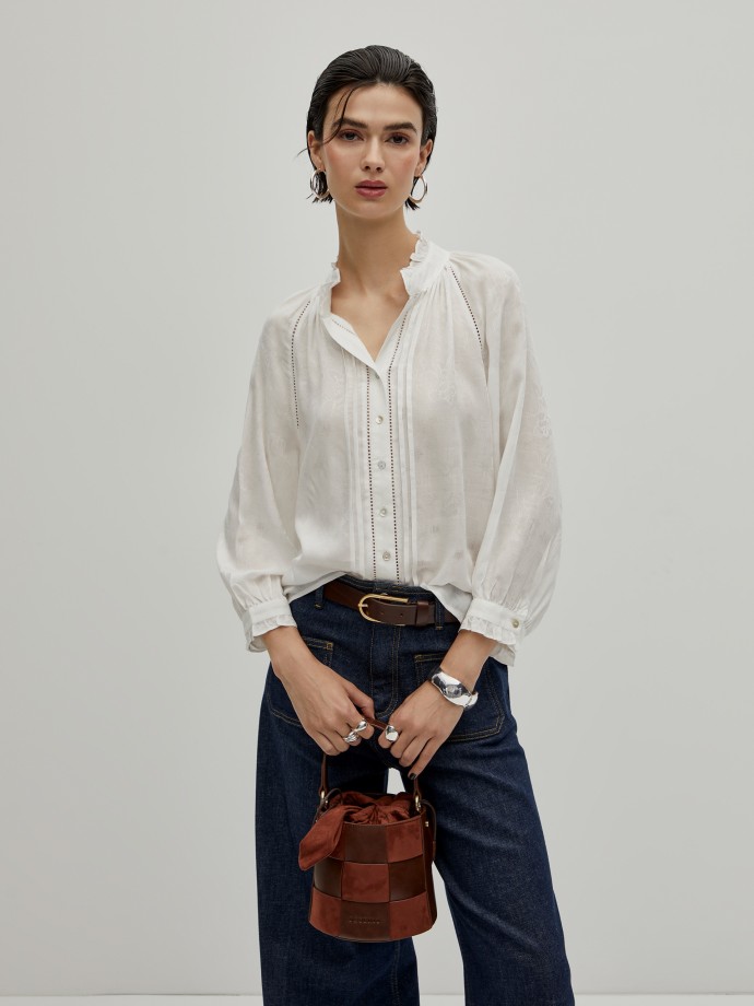 Blouse with pleats