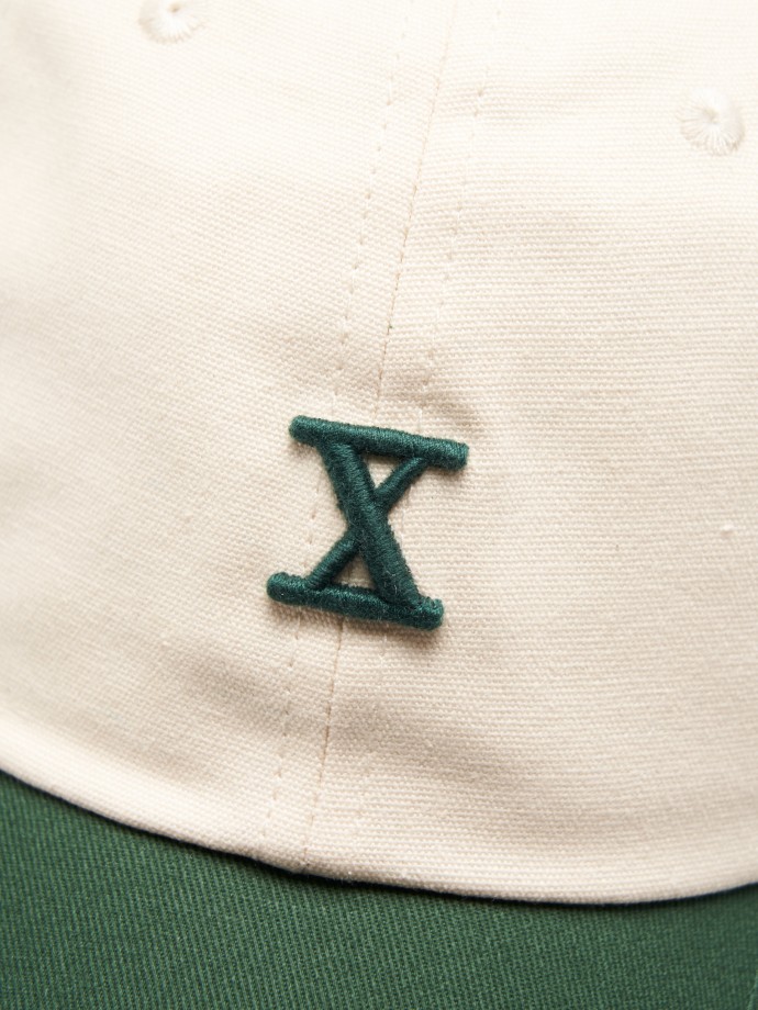 Curved brim cap