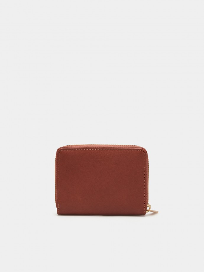 Porta-moedas em pele