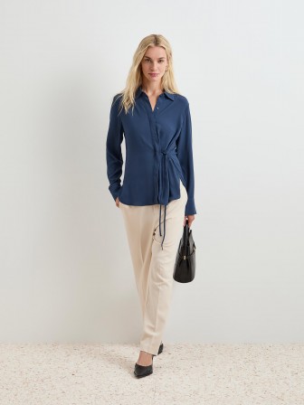 Blouse with side draping Blouse with side draping