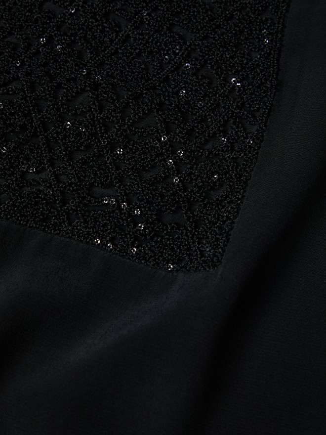 Camisa con detalle de crochet Camisa con detalle de crochet