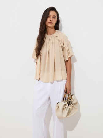 Flowy blouse with ruffles Flowy blouse with ruffles