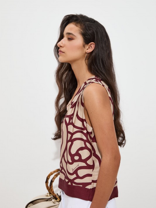 Top vaporoso estampado
