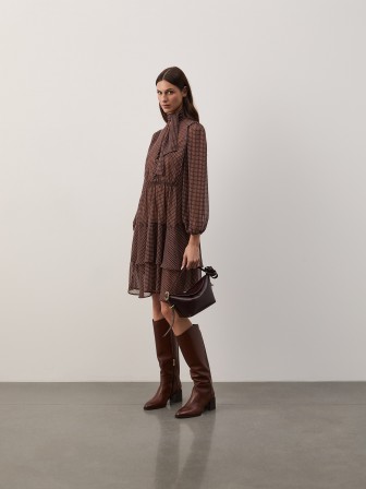 Vestido estampado com la�ada