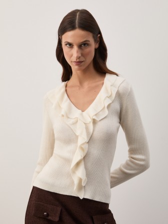 Knitted sweater with ruffles