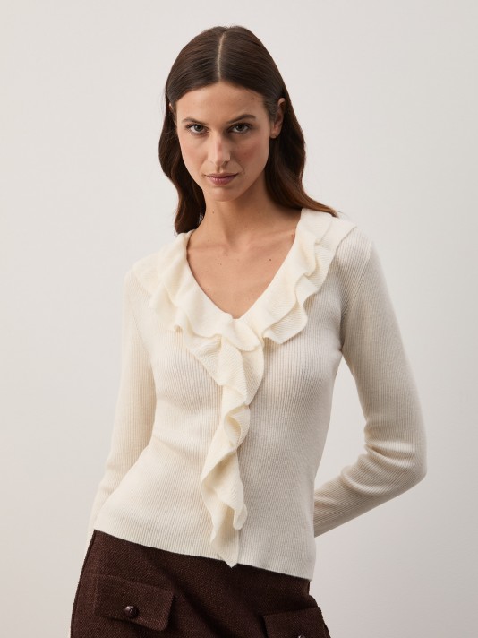 Knitted sweater with ruffles
