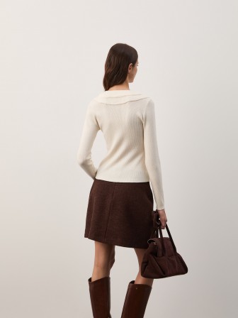 Knitted sweater with ruffles Knitted sweater with ruffles