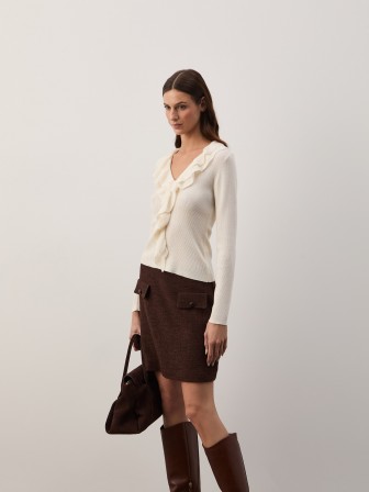 Knitted sweater with ruffles Knitted sweater with ruffles