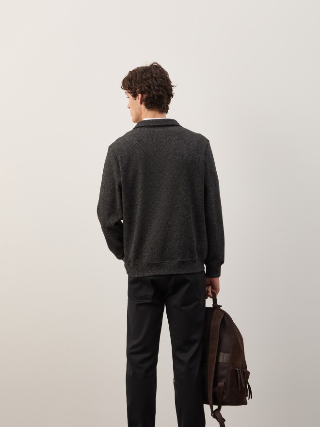 Two-tone sweater with half-zip closure