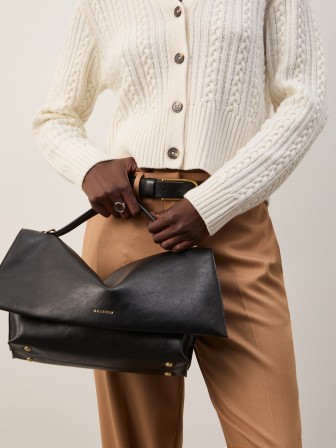 Straight-legged trousers with creases Straight-legged trousers with creases