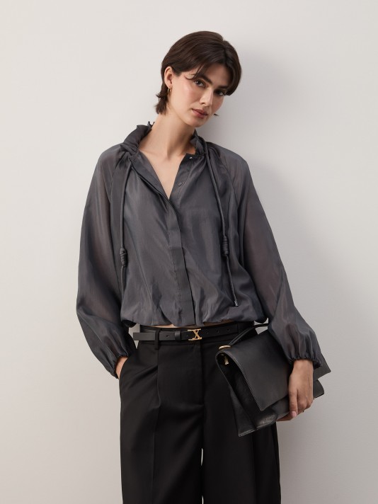 Flowy blouse with shimmer