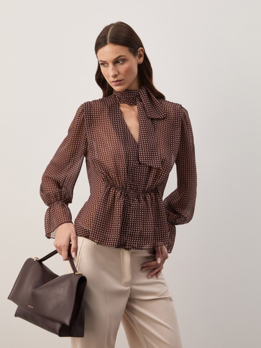 Flowy blouse with a bow